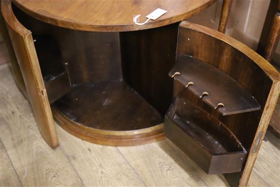 An Art Deco circular walnut coffee table with internal bar Diameter 83cm